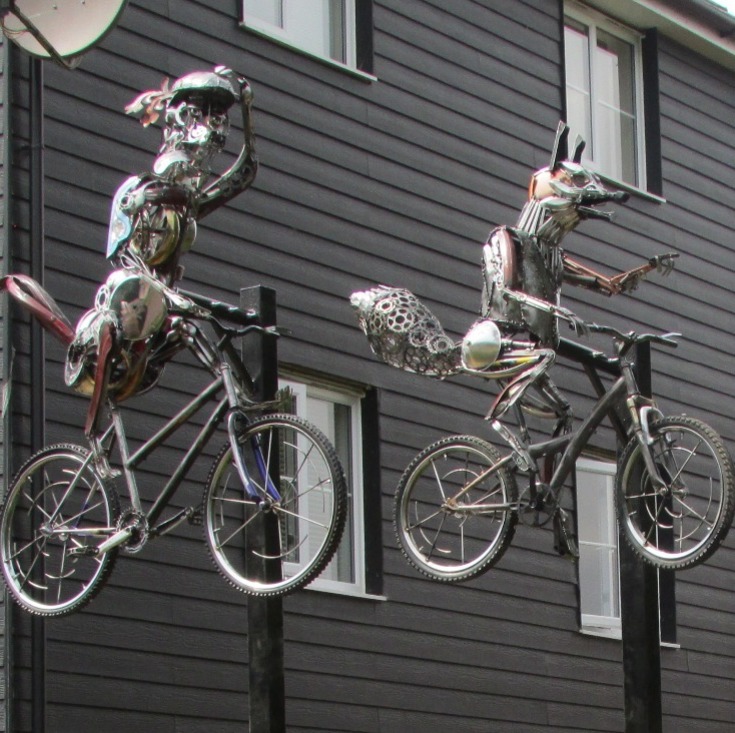 Fox on bike sculpture